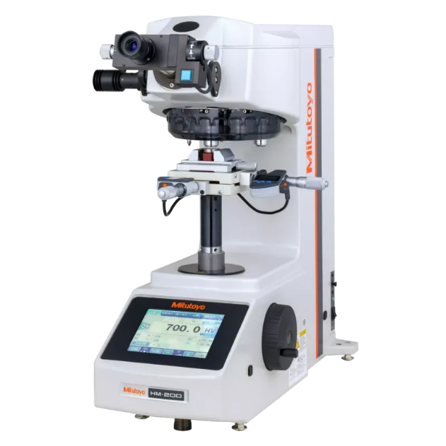 Hardness tester applying a controlled load to a metal test specimen