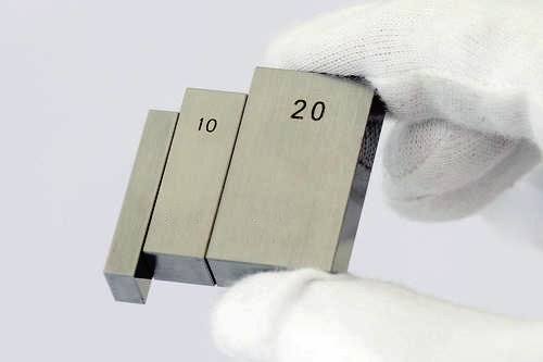 Close-up of gauge block faces prepared for wringing